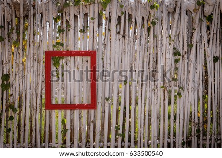 Red frame on the wooden battens, idea for decorate