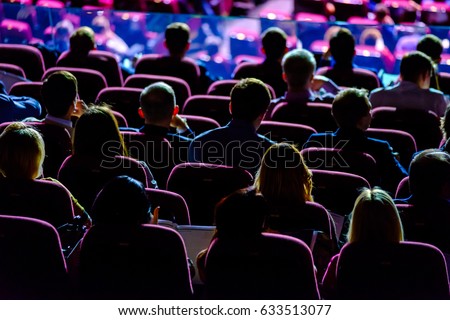 Audience listens to the speech of the lecturer in the conference hall Royalty-Free Stock Photo #633513077