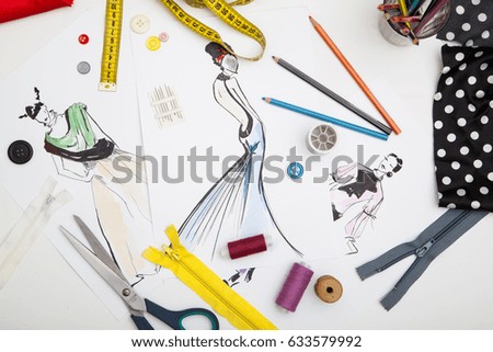 Fashion designer background of accessories and drawn picture of modern outfits