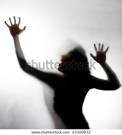 Silhouette of a screaming woman