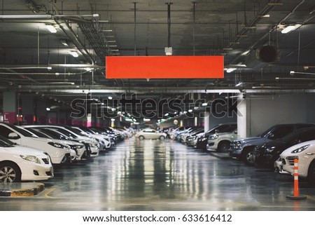 Concept sheet label write text.Cars parked in the parking lot.Open space area indoors.