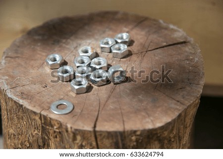 Nut and bolt isolated as a background or texture