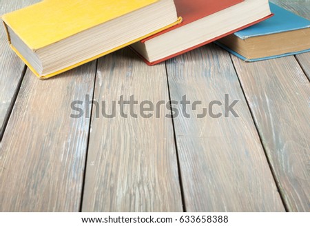 Colorful books on the table. Copy space for text. Education concept.