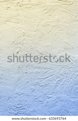 Background of a yellow-blue wall. Gradient of color