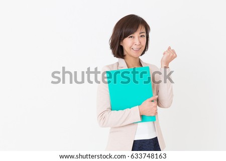 Asian middle age woman with files