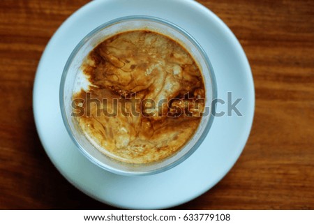 Picture of a beautiful coffee texture on wooden table