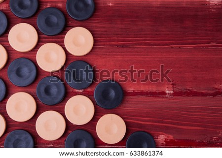 Backgammon on a wooden background