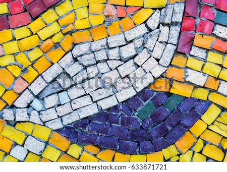 On the walls of colored tiles close up