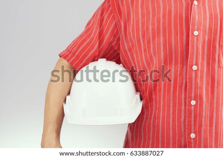 Engineer man with red shirt hold white engineer hat on white background. Industrial with people successful concept photography.