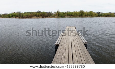 wooden bridge to the water, lake, sea