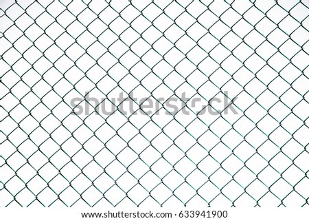 iron chain link fence background against sky
