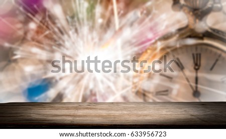 Empty rustic wood good for montage or display product for holidays with sparkler in background