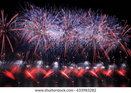Colorful fireworks explosion, New Year, amazing fireworks isolated in dark background close up with the place for text, Malta fireworks festival in Valletta 2017, Independence day
