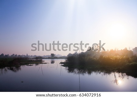 Landscape Silhouette of river on morning time in Water reservoir Rayong Thailand.