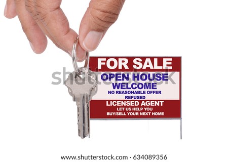 Hands holding keys real estate for sale open house sign isolated on white background