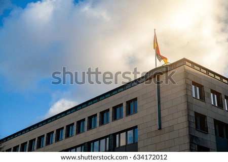 Flag of Germany on a building in Berlin.