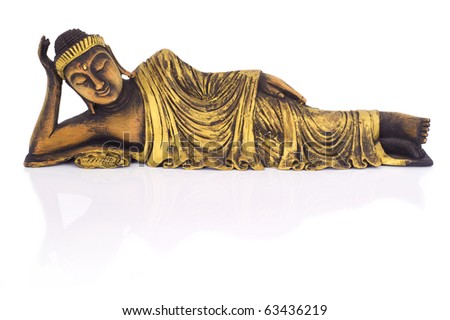 Lying Buddha statue made of teak wood on white.