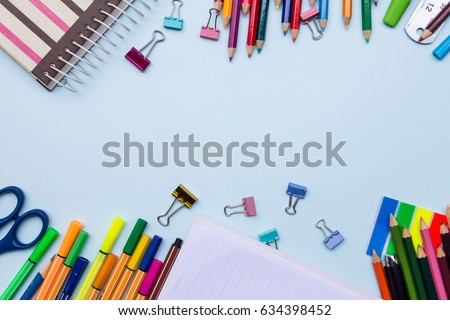 School stationary on the  blue background