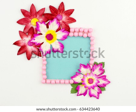 colourful paper flower texture on space background for your text 

 