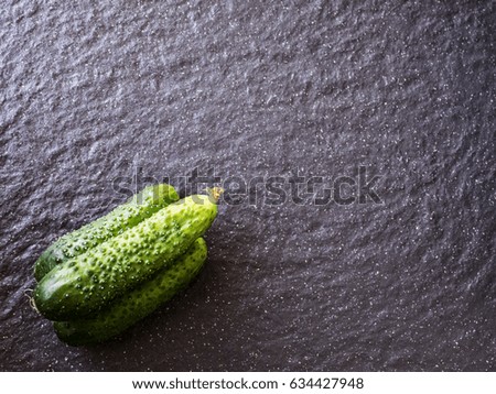 fresh Cucumbers on black background
