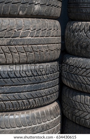 photo of stack of old tires - for sale at tire store