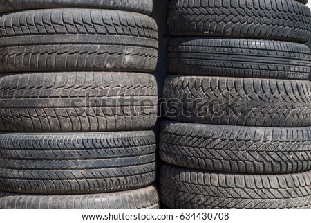 photo of stack of old tires - for sale at tire store