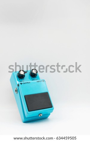 Vintage guitar pedal isolated on white background