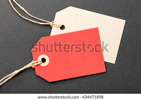 Paper tags on black