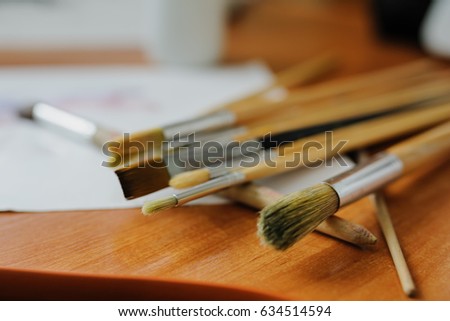 Paint Brushes Close-up in an artist atelier 