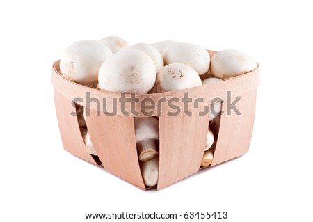 Mushrooms in box isolated on white background.