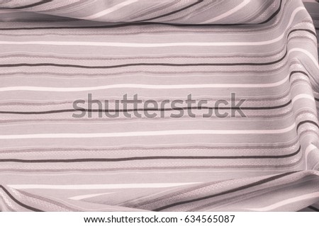 Texture, background, pattern. Woolen fabric is pale pink, striped.
Desktop wallpapers in the open air and a vacation with a picture. Black and white fabric fabric lines.