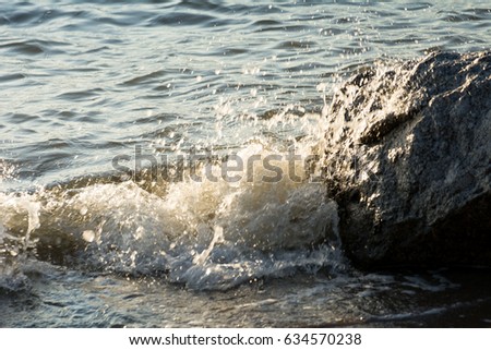 Sea waves crashing onto the Rocks