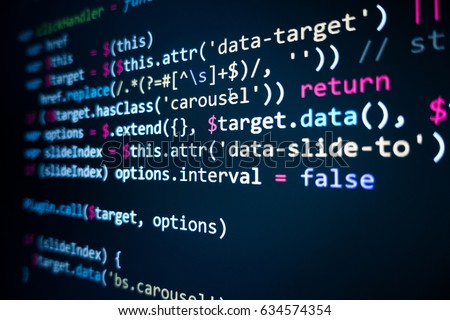 Software source code. Programming code. Programming code on computer screen. Developer working on program codes in office. Source code photo. Technology background. Royalty-Free Stock Photo #634574354