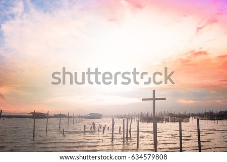  cross on blurry sunset background