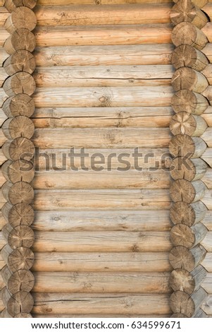 Texture of a ancient wall of wooden logs, abstract background