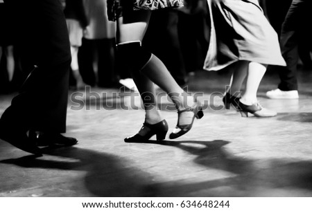 vintage photography in black and white of swing dancing couples Royalty-Free Stock Photo #634648244