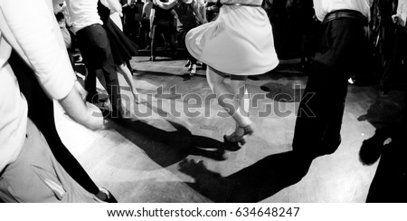 vintage photography in black and white of swing dance couples Royalty-Free Stock Photo #634648247