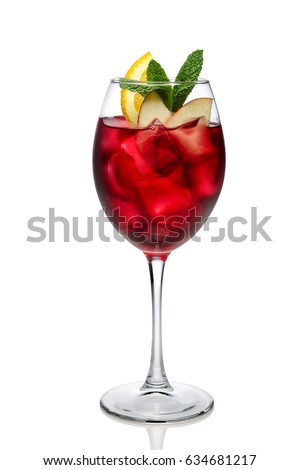 Cold sangria in a wine glass isolated on white. Royalty-Free Stock Photo #634681217