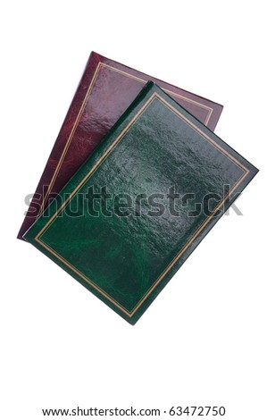 green and red antique photo albums isolated on white background