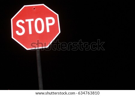 Stop sign in the dark