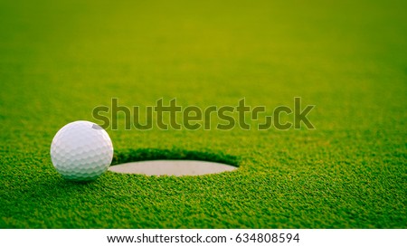 golf ball in the hole