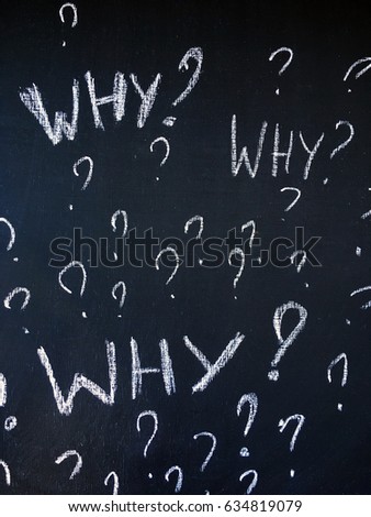 concept why background. why chalkword on black background with many question marks