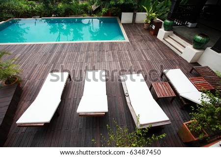 swimming-pool in a hotel Royalty-Free Stock Photo #63487450