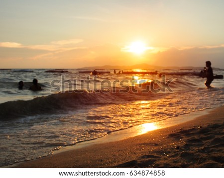 Blurred picture sunset at the sea for background in summer concept with copy space.