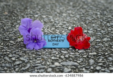 word  happy mother's day on wooden tag with flower.concept image.