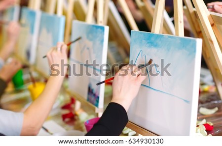 painting at art school. Royalty-Free Stock Photo #634930130