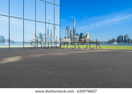 cityscape and skyline of shanghai  from empty asphalt road