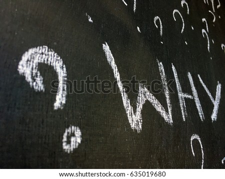 concept why background. why chalk word on black background with many question marks