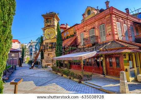 The old town of Tbilisi, Georgia, with the fairy tale Clock Tower of puppet theater Rezo Gabriadze Royalty-Free Stock Photo #635038928