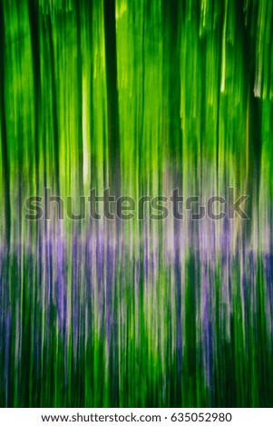 Abstract forest background in green and purple tones. Vertical lines vintage filter applied
